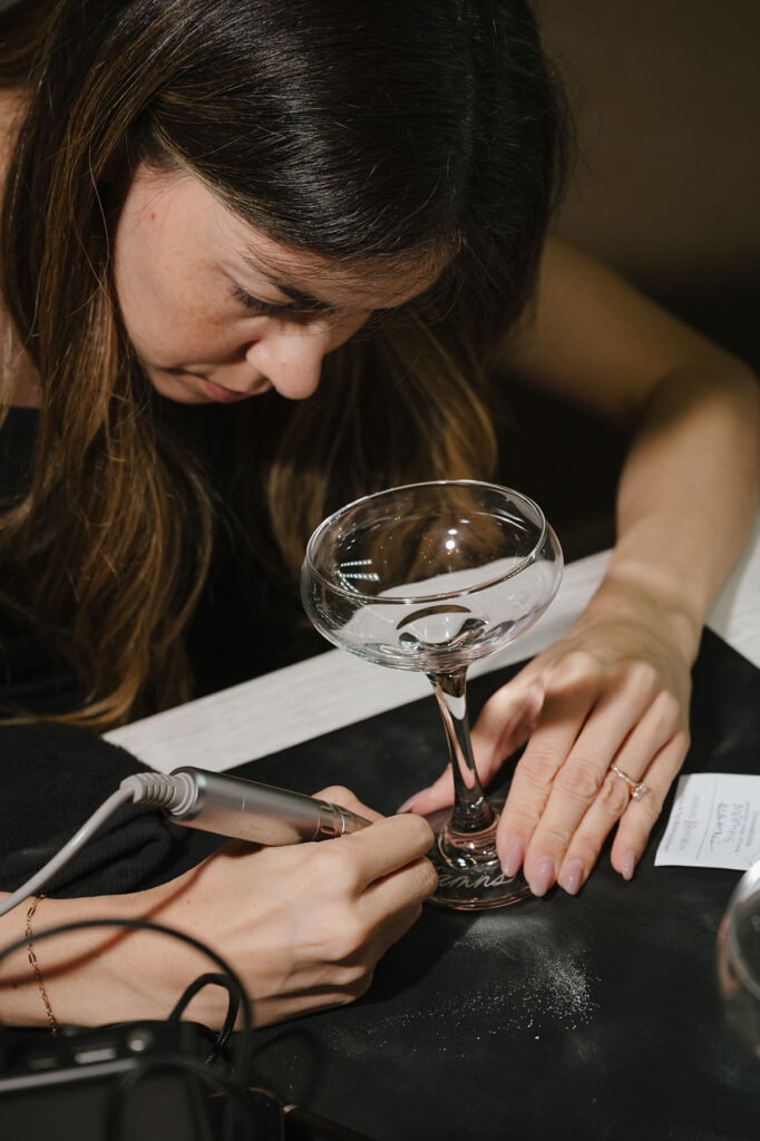 Los Angeles Hand Engraver Dani personalizing coup glasses
